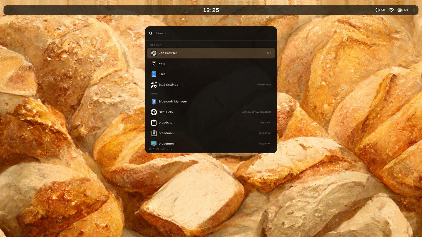 A fresh BOS desktop: breadbar along the top, breadbox launcher open over the default bread wallpaper.